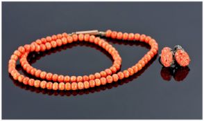 A Natural Coral Necklace with 10ct gold clasp. c. mid 19th century and coral set pair of earrings.
