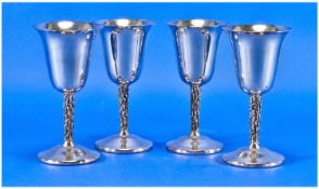 Four Silver Plated Wine Goblets.