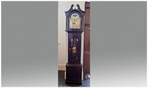 Modern Three Weight Contemporary Longcase Clock, Mahogany Finish, Brass Squared Dial With Rolling