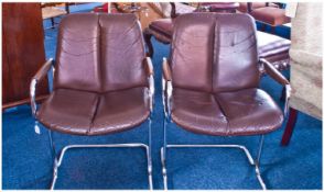 A Pair of Eleganza Designer Leather and Chrome Armchairs, with tubular frame construction, open