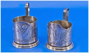Two Soviet Tea Holders, Propaganda Tea Glass Holders, One With A Scene Showing A Rocket The Other A