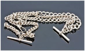 A Sterling Silver Double Albert Watch Chain, together with a sterling silver single Albert chain.