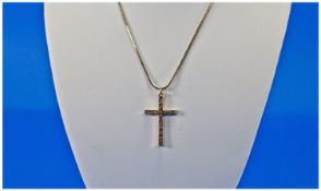 9ct Gold Cross And Chain. Fully hallmarked. 19 inches in length. 8.2 grams.