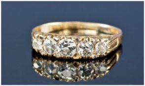 18ct Gold Set 5 Stone Diamond Ring. Circa 1920`s. The cushion cut diamonds of good colour.