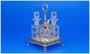 Four Piece Silver Plated Cruet Stand, With Pierced Gallery Raised On Claw Feet. Early 20thC