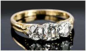 18ct Gold Three Stone Diamond Ring, Set With A Central Modified Cushion Cut Between Two Round Cut