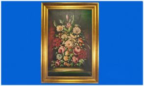 Floral Painting On Canvas. A vase of mixed flowers on a ledge in the Dutch style, with a dark