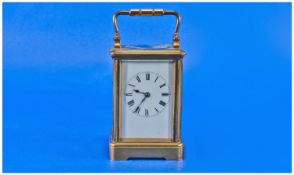 French Early 20th Century Brass Carriage Clock with visible escapement. Working order. Stands 6.75