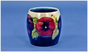 William Moorcroft Small Barrel Shaped `Pansy Vase` 1918-25 signed W Moorcroft. Height 3 Inches.