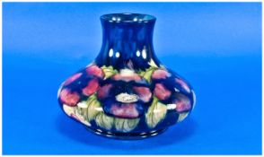 Moorcroft 1920`s Large Red-Blue Pansy Onion Shaped Vase on blue ground, over painting to body. 6.5