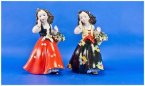 Two Similar Lenci Style Flower Girl Figures, one dressed in an orange, semi-matte glazed, full