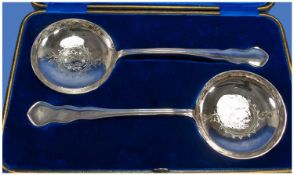 A Good Quality of Pair of Silver Plated Egg Serving Spoons with engraved bowls and fitted case,