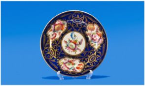 A Possible Derby 8.5 inches Hand Decorated Plate with later blue and gilt decoration at same