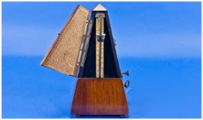 Walnut Cased Metronome, made by Metronome De Maelzel, Berlin and Paris. Circa 1900.