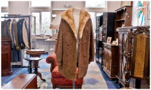 Mid Brown Persian Lamb and Golden Mink Three-Quarter Length Coat, the golden blonde mink collar