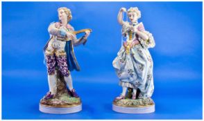 Pair of French Semi-Bisque Figures, probably Gille Jeune, both dressed in elaborate 18th century