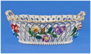 Dresden `Porcelain` `Lattice Worked` Basket, Hand painted with raised flowers. Length 9½ Inches