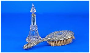 Silver Collared Cut Glass Scent Bottle and Silver Backed Hairbrush, the bottle with flared base and