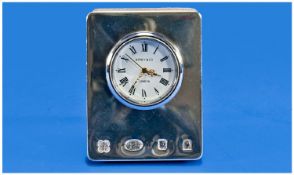 A Silver Bedside Clock with Plush Reverse. Feature London hallmarks by Kitney and Co.