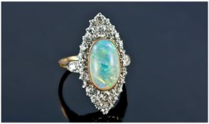 Art Deco Fine 18ct Gold Set Diamond and Opal Ring. The single stone Opal of good colour. Surrounded