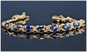 18ct Gold Diamonds And Sapphire Bracelet. The Diamonds and Sapphires of good quality. 7.5 inches in