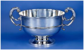 Edwardian Large And Impressive Two Handled Silver Pedestal Trophy Punch Bowl Of Plain Form.