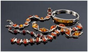 Collection Of 4 Amber Coloured Silver Bracelets Together With A Hinged Bangle.