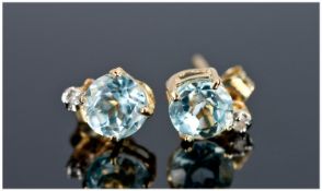 Topaz & Diamond Stud Earrings Set in 9ct gold