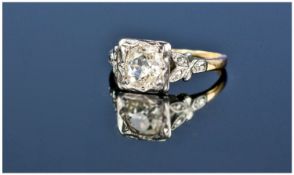 18ct Gold And Platinum Set Single Stone Diamond Ring. Circa 1920`s. The cushion cut diamond of good