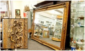 Extremely Large 20th Century Bevelled Edge Ornate Gilt Framed Mirror in Victorian style. Modern.