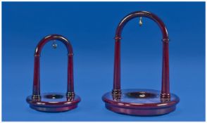 A Good Quality Matching Set of Lacquered Wooden Pocket Watch Stands, (2) in total. Raised on ball