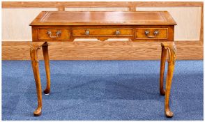 Reproduction Burr Walnut Ladies Writing Table, With Tooled Leather Top, Raised On Carved Cabriole