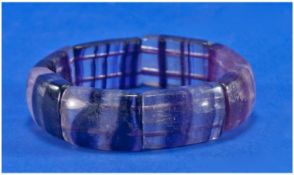 Purple Striped Fluorite Bangle, made up of eight large rectangular pieces of the gemstone from