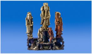 Large Chinese Soapstone Group Of Deities. Three large figures standing on a rocky outcrop with two