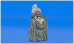 Lladro Gres Figure ``Chinese Sleeping``. Number 2056, height 6.75 inches.