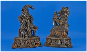 Pair of Cast Iron Door Stops of Punch and Judy, 13 inches in height.