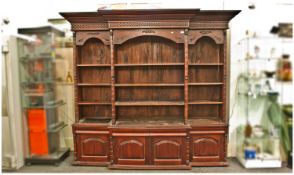 Large Modern Breakfront Bookcase, with over hanging moulded cornice, with Gothic detailing, four