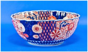 Large Oriental Imari Bowl, with red and blue colourway. 5 inches high and 12 inches diameter.
