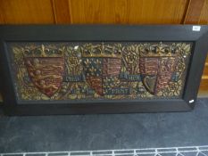 H.G. Hiller Gesso on Board, depicting three Royal Coats of Arms, signed, measuring 43 by 19 inches.