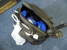 Back Pack Containing a Collection of Fishing Reels with various associated implements.