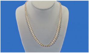 A Good Quality Vintage Single Strand Set Of Cultured Sea Pearls. with 9ct gold diamond set clasp.