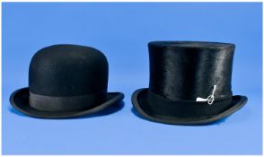 Traditional Bowler Hat by Dunn and Co, London. Together with black formal top hat by Moss Brothers.