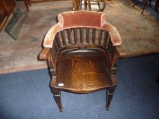 Early 20th Century Oak Desk Chair, padded back rest and arms, saddle seat, raised on a square