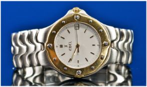 Ebel Stainless Steel 18ct Gold Sport Wave Gents Wrist Watch. Model number 6187631. 18ct gold bezel