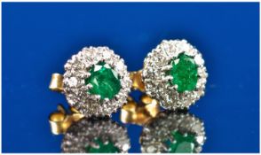 18ct Gold Set Pair of Diamond and Emerald Earrings of Good Quality. The single stone emeralds