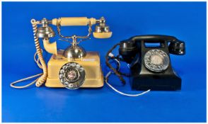 Mid 20th Century Black Bakelite Telephone, with spin dial, together with a yellow telephone, with