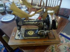 German Sewing Machine in Oak Case, by Frister & Rossmann.