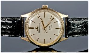 Jaeger-Le-Coultre 9ct Gold Cased Automatic Wrist Watch, fitted on a black leather strap. Date 1969.