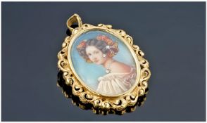 18ct Gold Ornate And Fine Framed Portrait Miniature Pendant. The portrait of a young woman hand