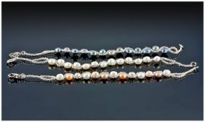 Cultured Freshwater Pearl Three Bracelet Set, one of oval peacock pearls, one of white, and one of